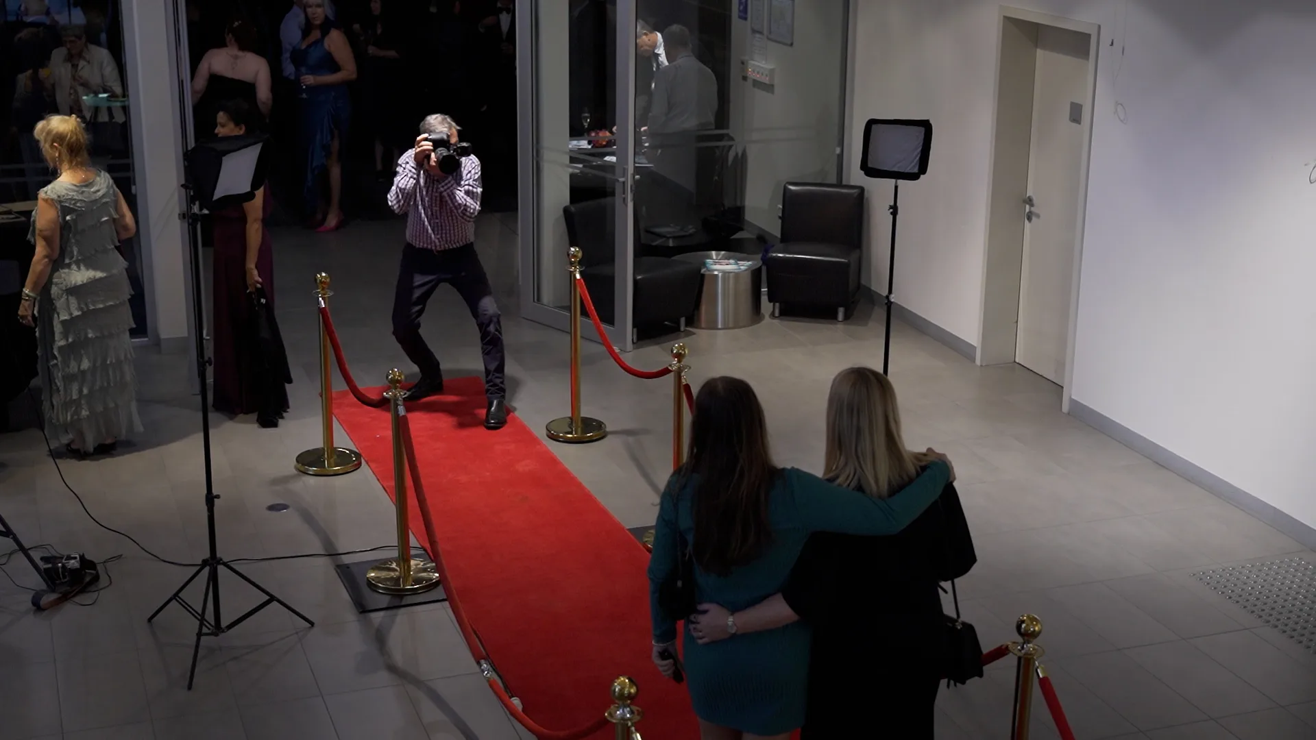 Photographer capturing guests on the red carpet